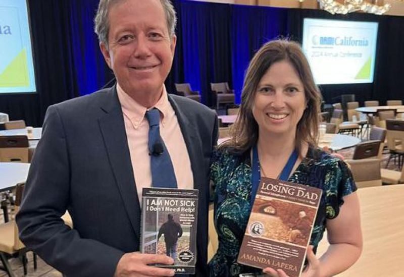 Amanda LaPera with the doctor who wrote the foreword to Losing Dad.